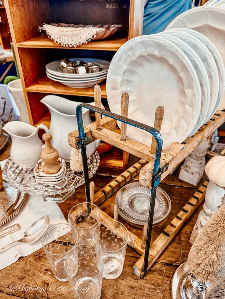 Ironstone plates and pitchers on display at Vintage and Vogue Market in Kensington, NH.