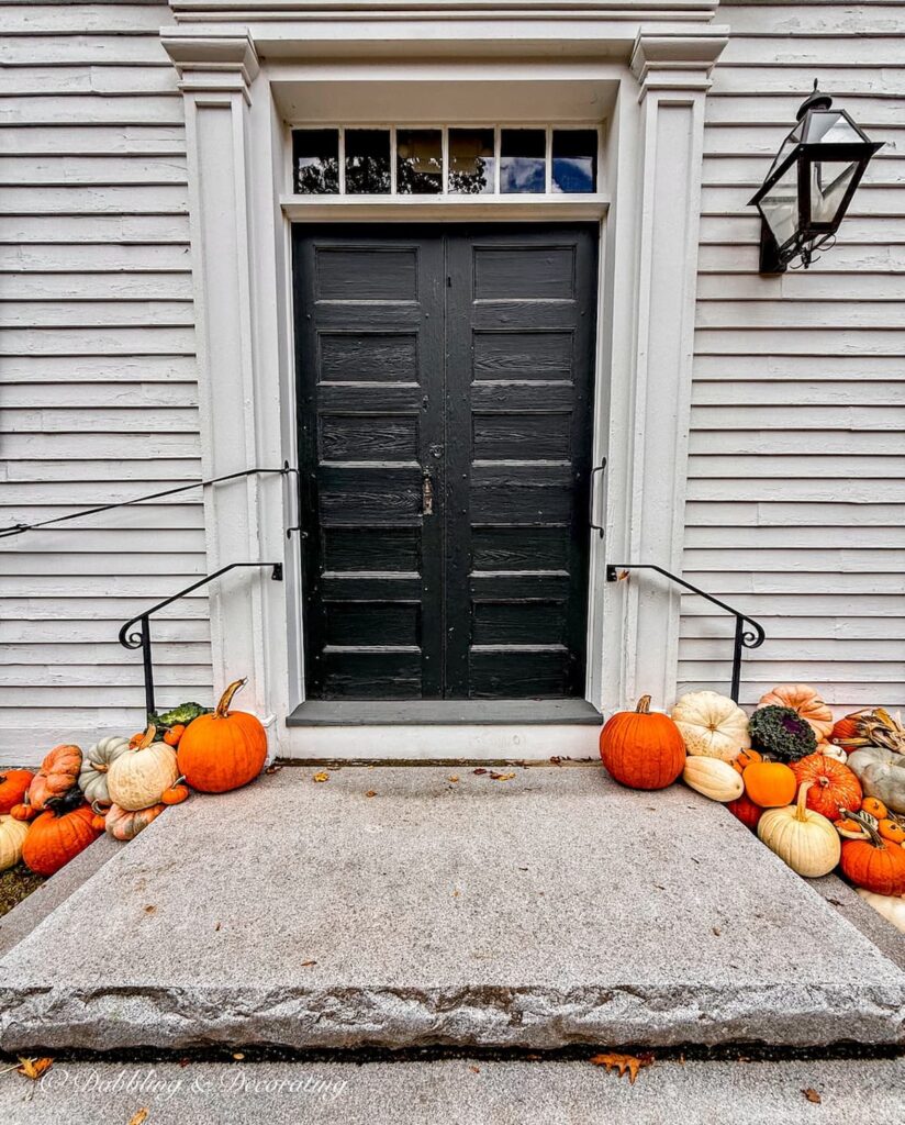 The Grange front door decorated for fall in Kensington, New Hampshire while visiting the Vintage and Vogue Market.