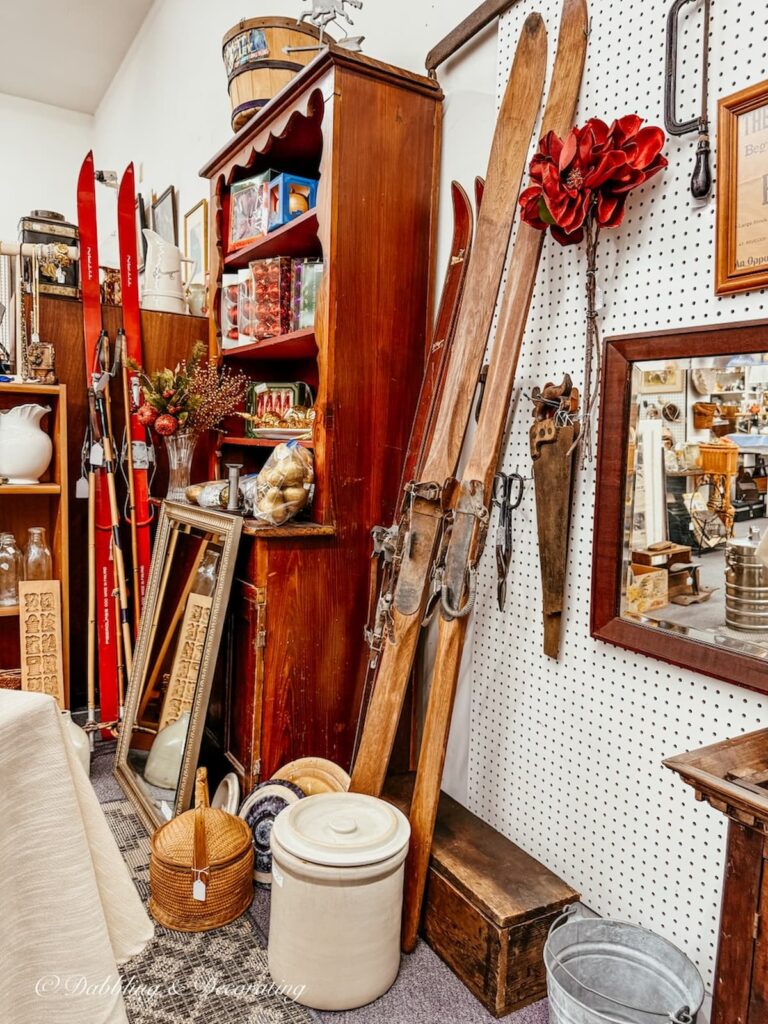 Vintage Skis in vendor booth at Great Finds Antiques in Sheffield, Massachusetts antiquing in the Berkshires.