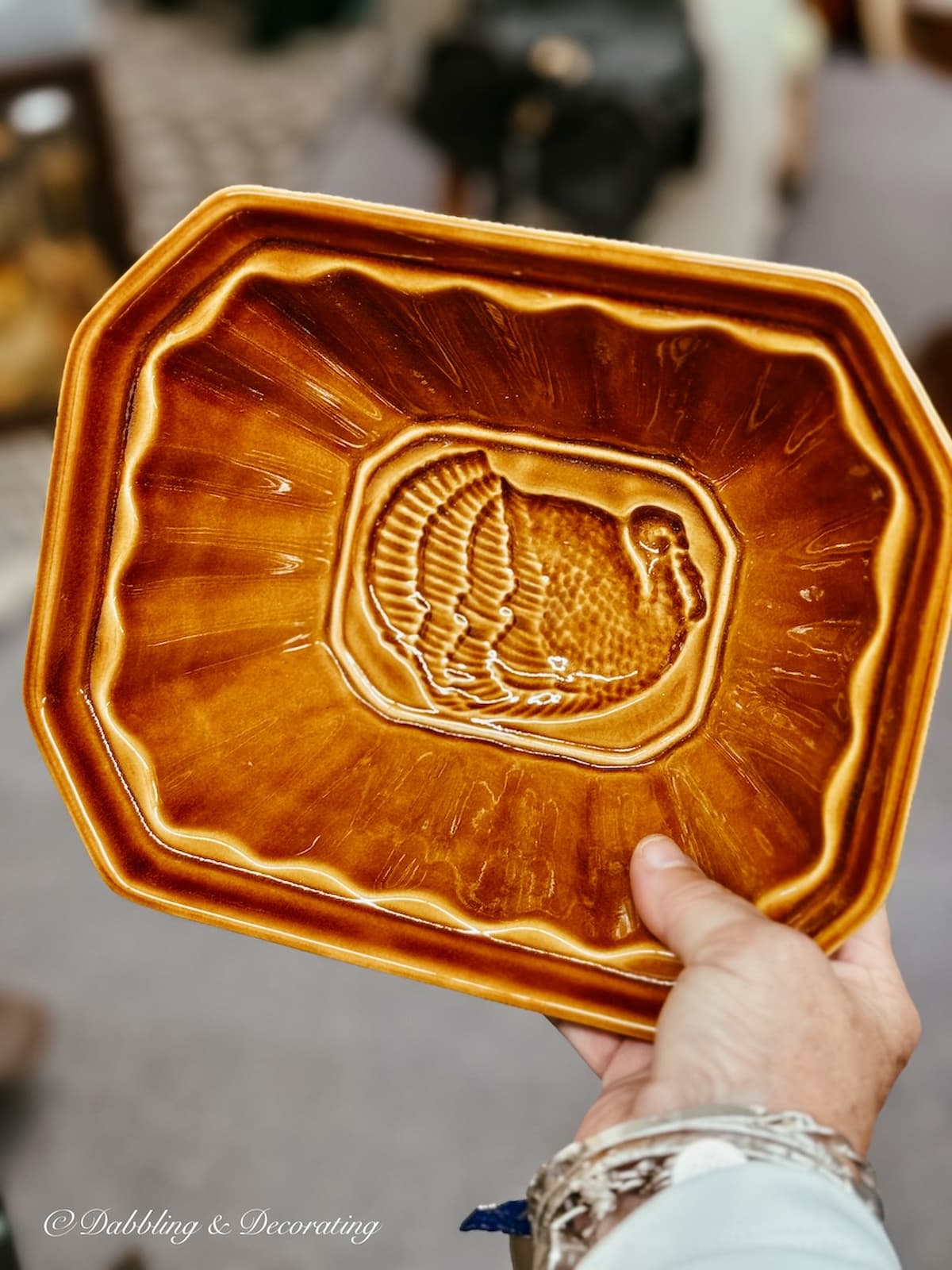 Modern day porcelain brown mold with Turkey at the bottom.