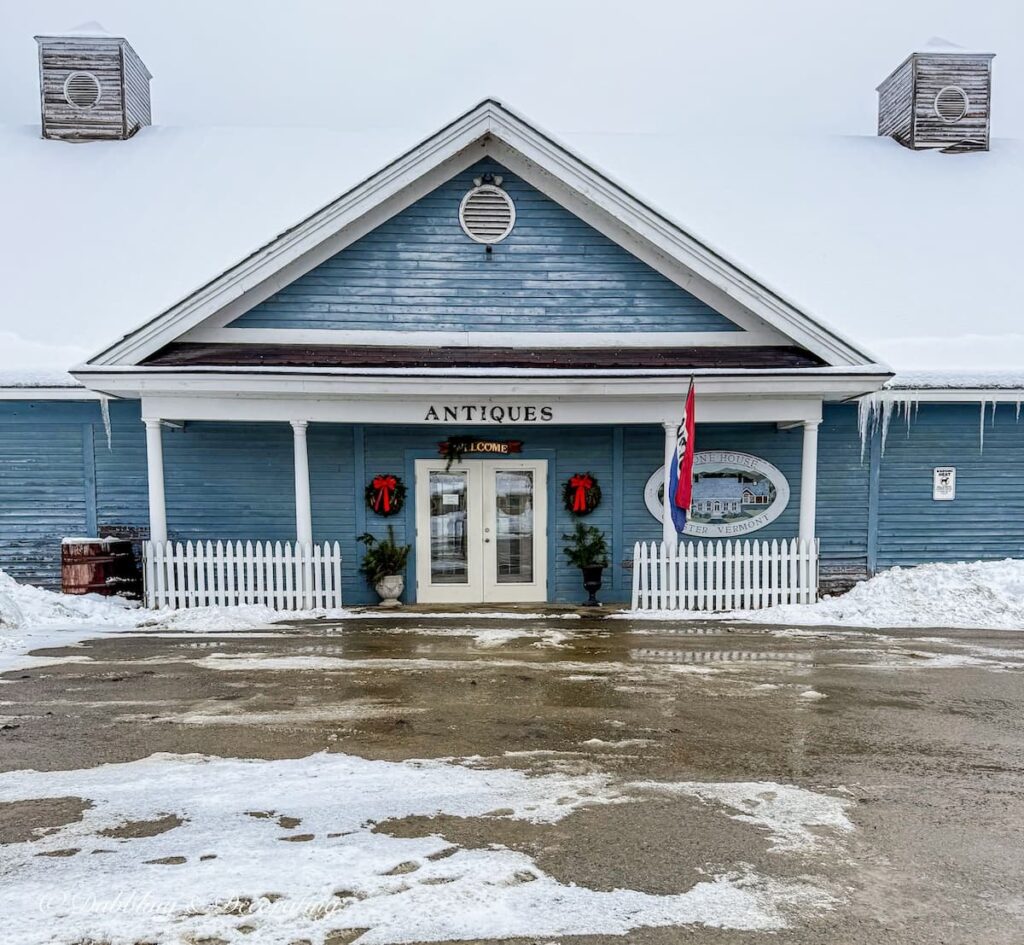 Stone House Antique Center in winter's snow in Chester, Vermont.