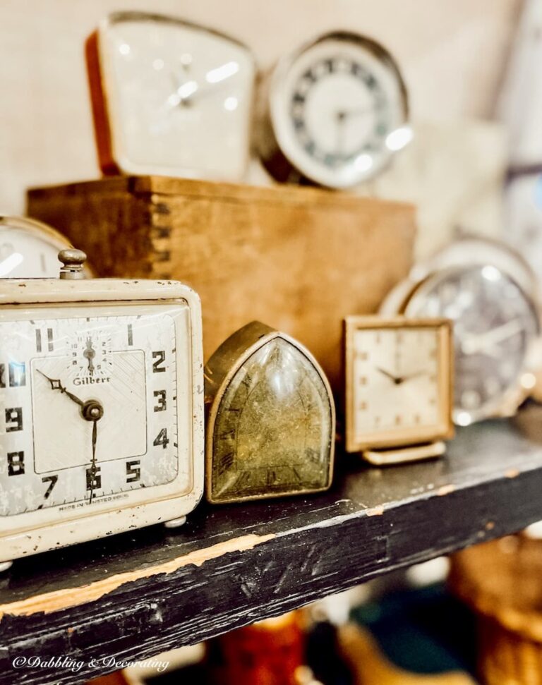 Vintage alarm clocks displayed at flea market, great for vintage gift ideas for collectors.