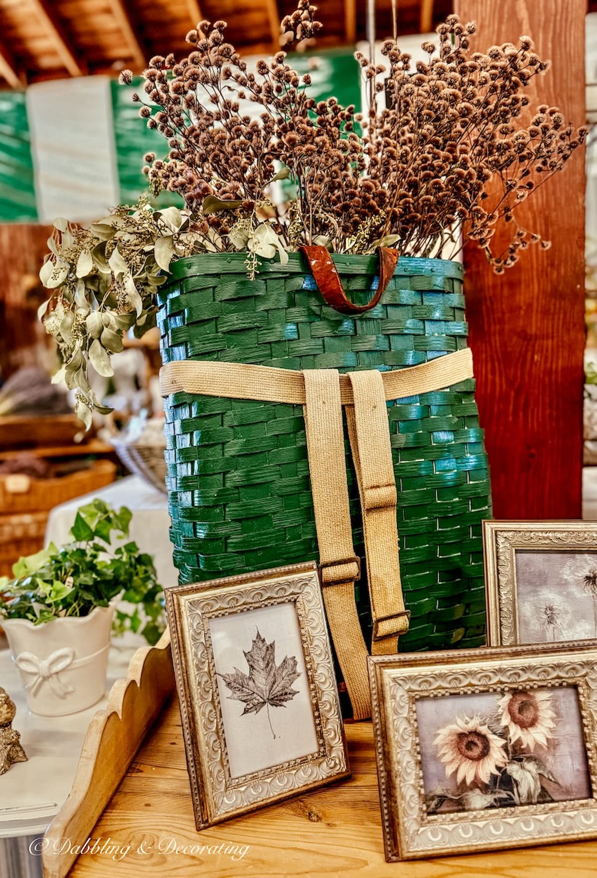 Green vintage backpack displayed at Vintage Market Days Vermont for vintage Christmas Decor.