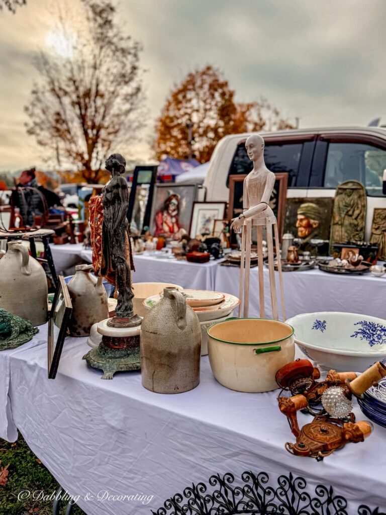 Vendor booth with beautiful antiques at Elephant Trunk Flea Market, New Milford, CT.