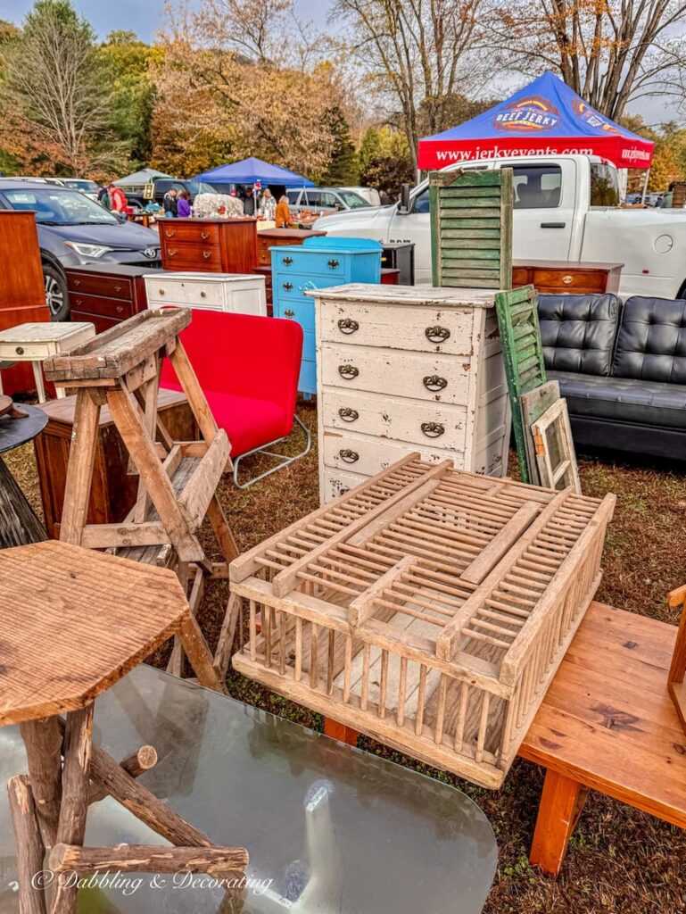 Antique furniture in vintage booth at Elephant's Trunk Flea Market in Connecticut.