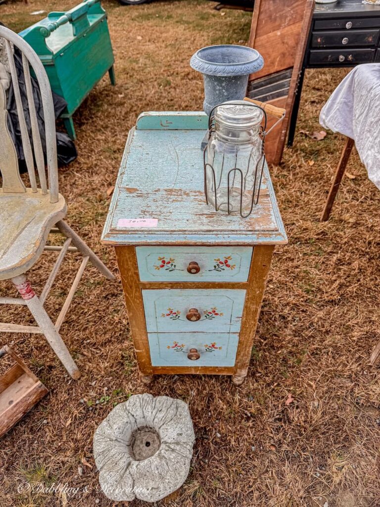 vintage blue and brown side table with drawers at Elephant Trunk's Flea Market that I left behind.