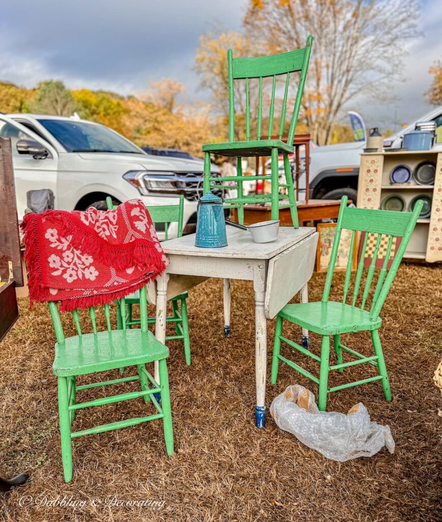 Three vintage green chairs displayed at Elephant Trunk's Flea Market.