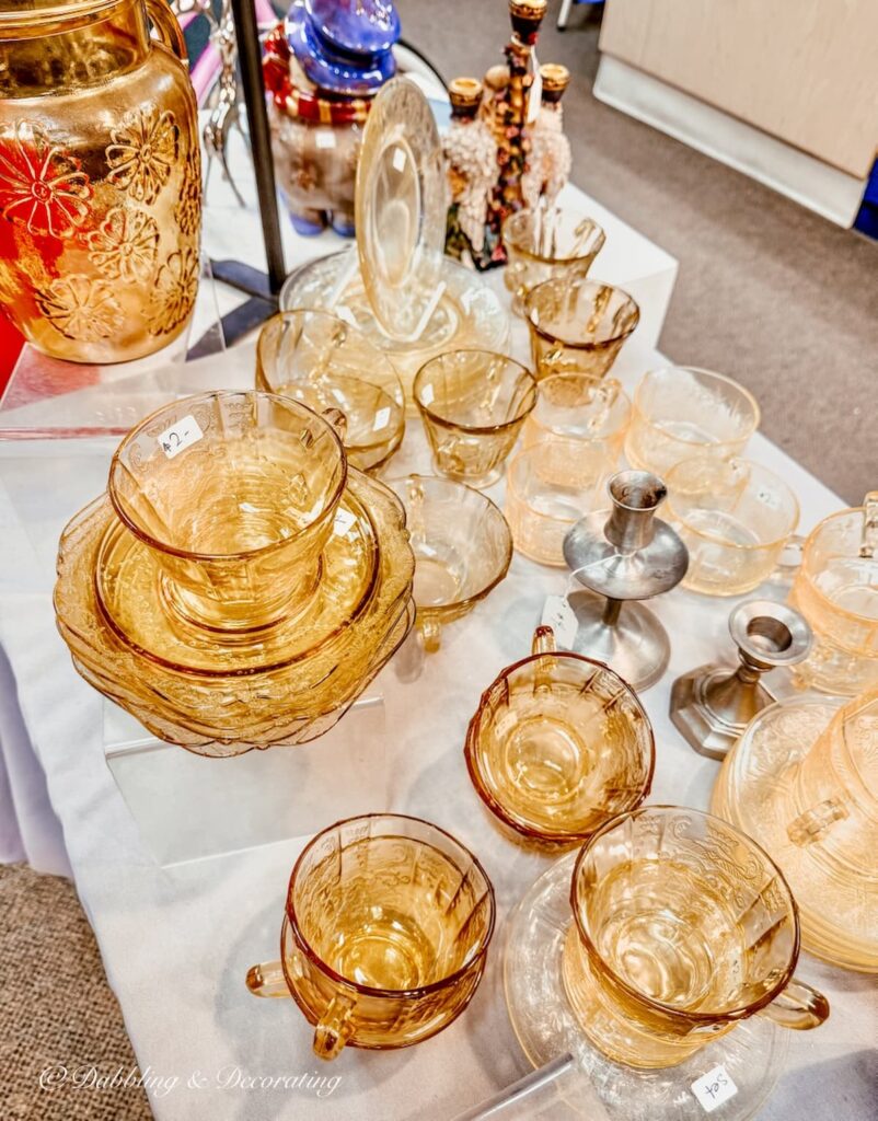 Vintage depression glassware dishes in yellow at The Second Show thrift shop on Warren St. Hudson, NY