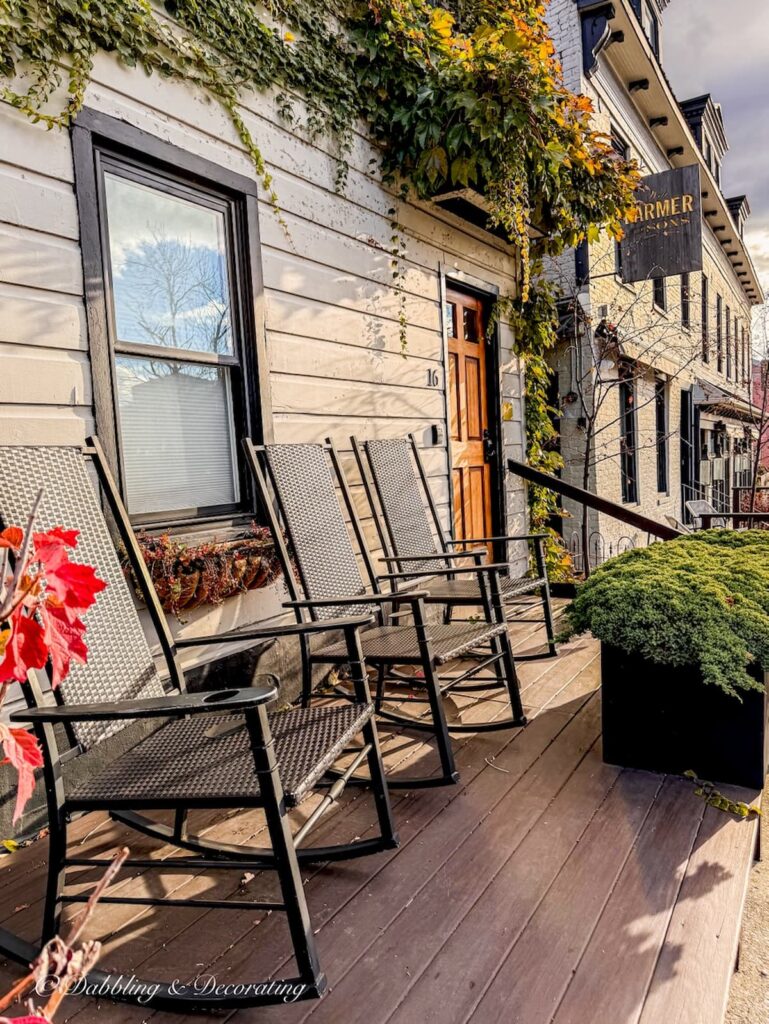 WM Farmer and Sons porch with rocking chairs outside the Inn in Hudson, NY.