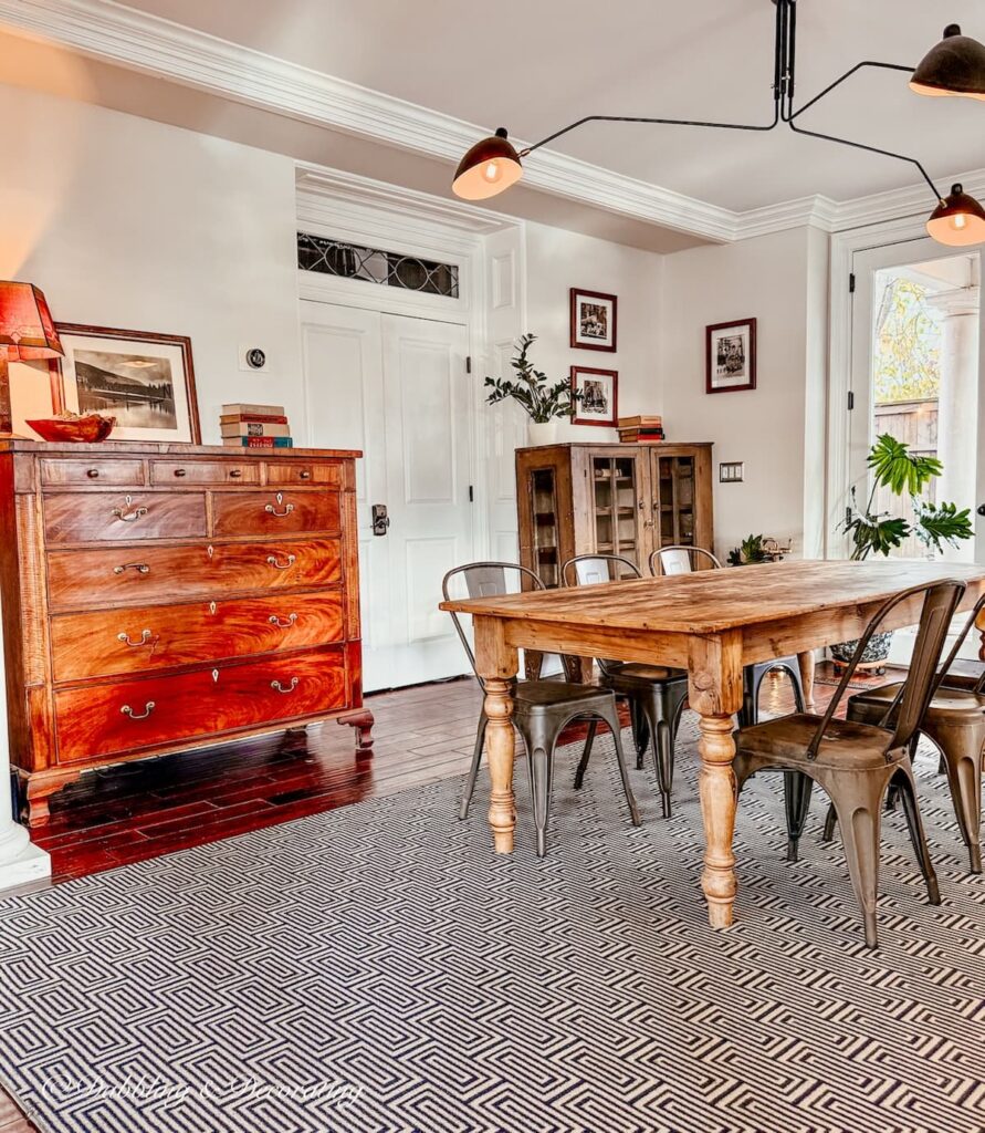 Common family room at the WM Farmer and Son Inn for guests to enjoy with games, kitchen, farmhouse table and more in Hudson, NY.