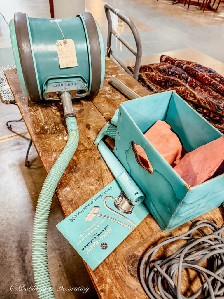 Vintage aqua blue general electric vacuum cleaner at The Antique Warehouse Hudson, NY