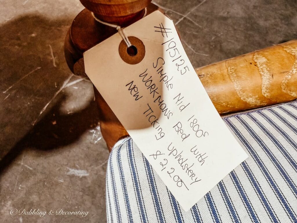 Price tag of $2200 for the primitive "workman's bed" at The Antique Warehouse Hudson, NY