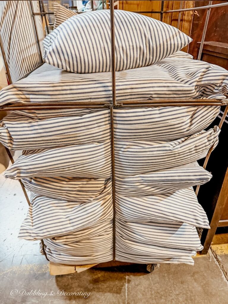 handmade locally farmhouse style blue and white ticking pillows in cases at The Antique Warehouse Hudson NY