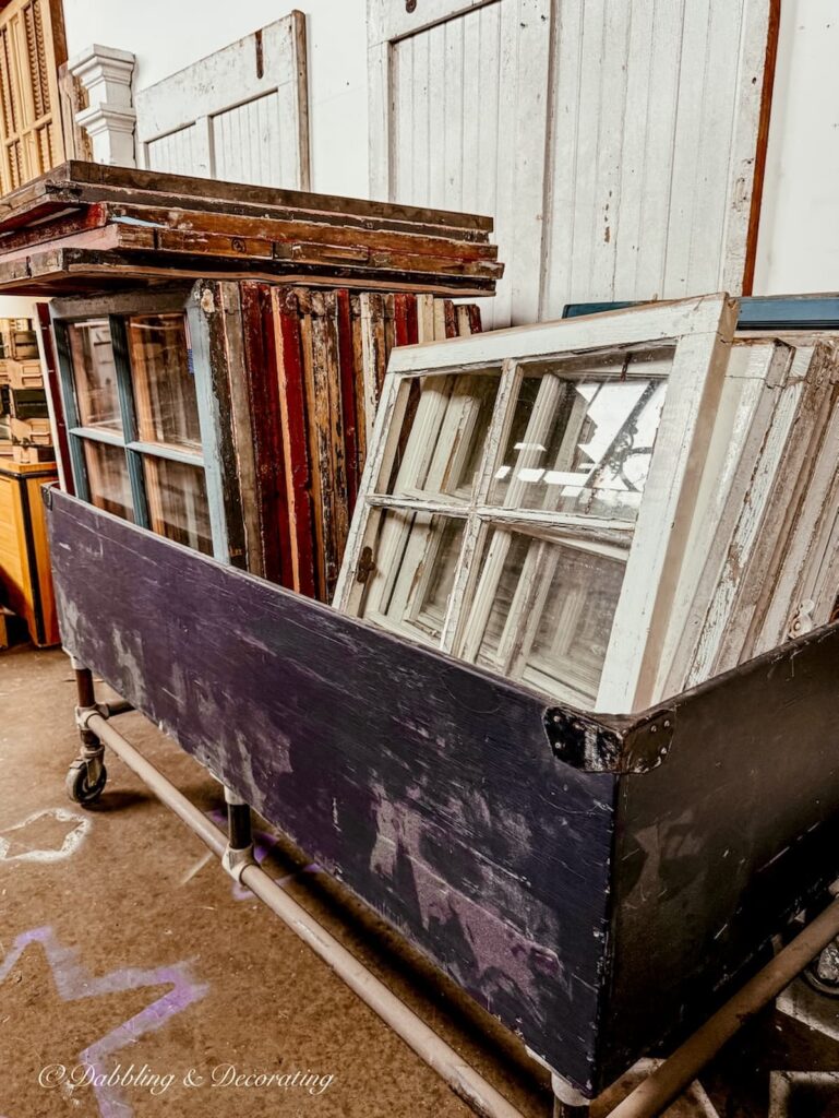 Box on wheels filled with salvaged windows at The Antique Warehouse Hudson, NY.