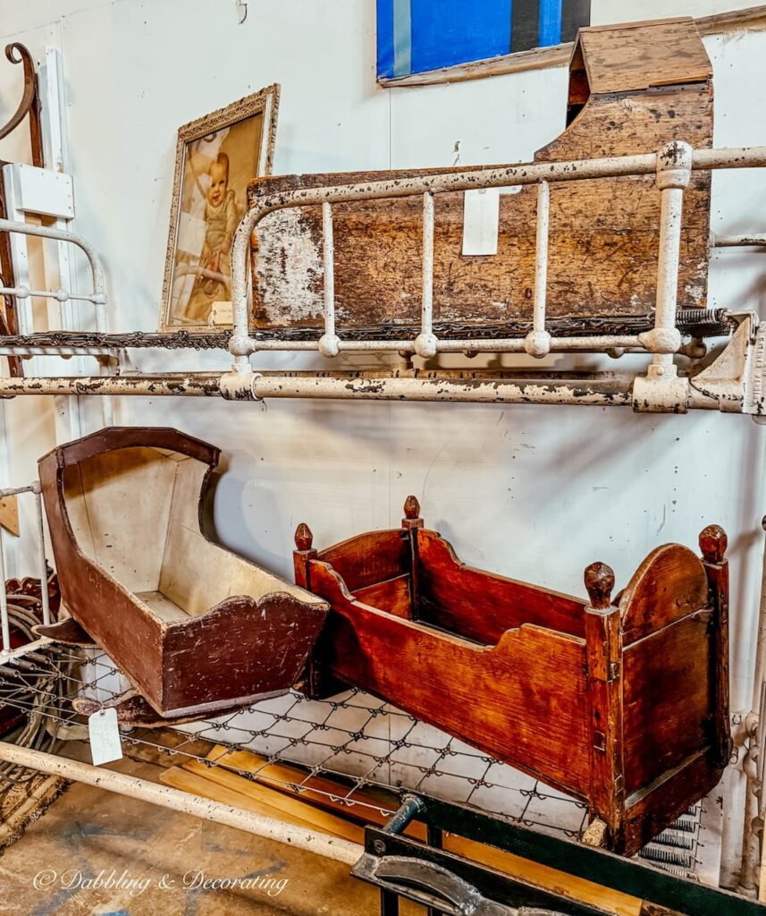 A collection of antique baby cradles at The Antique Warehouse Hudson, NY