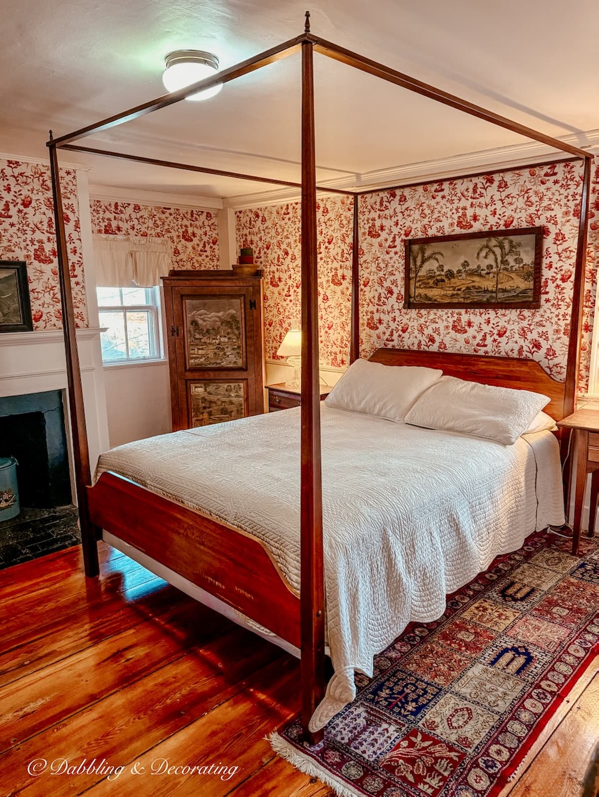 Canopy bed in colonial style bedroom at the Clark Currier Inn in Newburyport, Massachusetts. Bedroom wallpaper ideas.