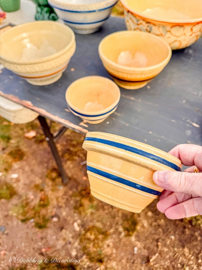 Antique Yellow ware bowl in hand at Todd Farm Flea market.