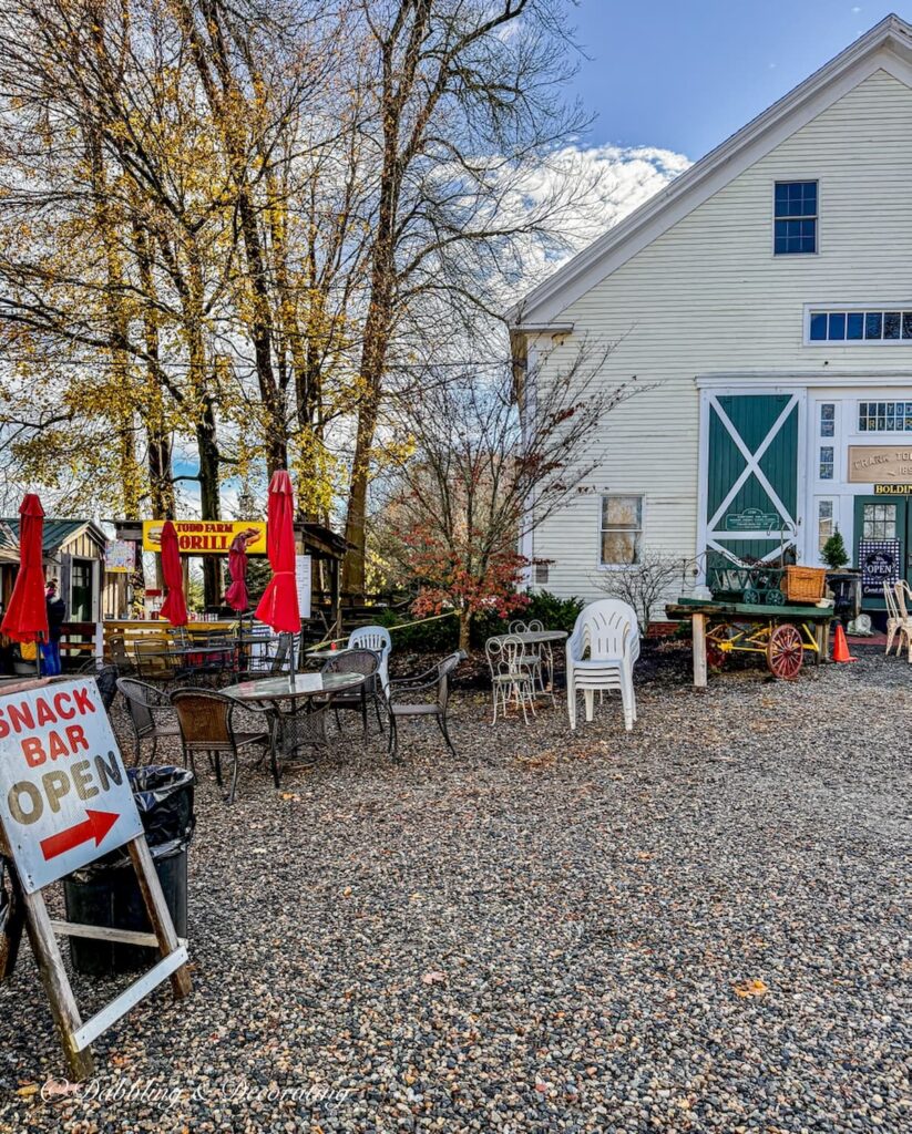The Barn at Todd Farm Antiques and Flea Market and sign to Snack Bar in Rowley, Massachusetts.
