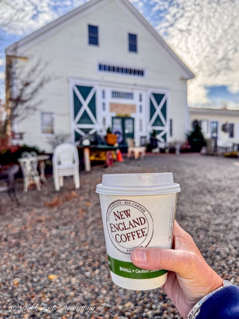 New England Coffee cup in hand entering The Barn at Todd Farm Antiques in Rowley, Massachusetts.