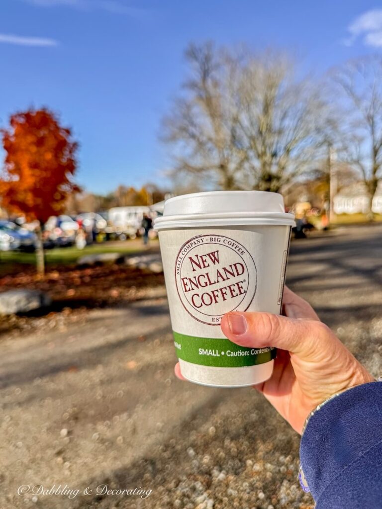 New England Coffee mug in hand toasting to the Todd Farm Antiques and Flea Market in Rowley, Massachusetts on a November morning.
