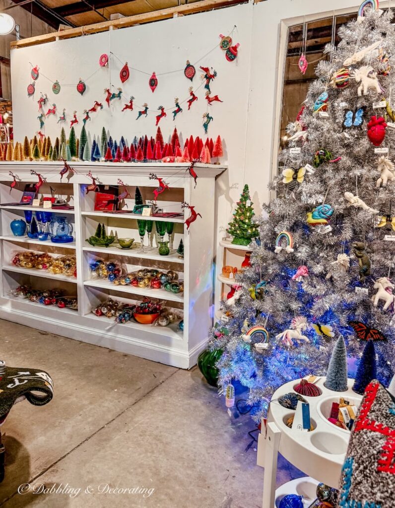 Retro eclectic Christmas decor with bottle brushes and silver tree ornaments antiquing in Burlington, Vermont.