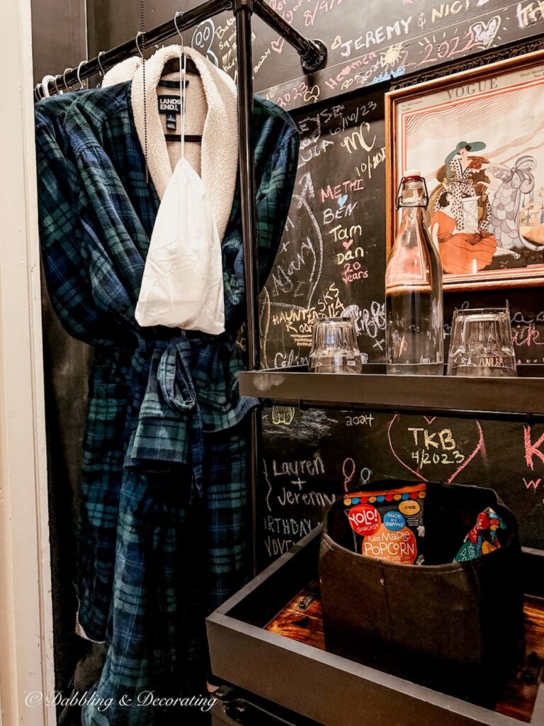 Plaid bathrobe hanging up in the closet at The Made INN Vermont Burlington, Vermont.