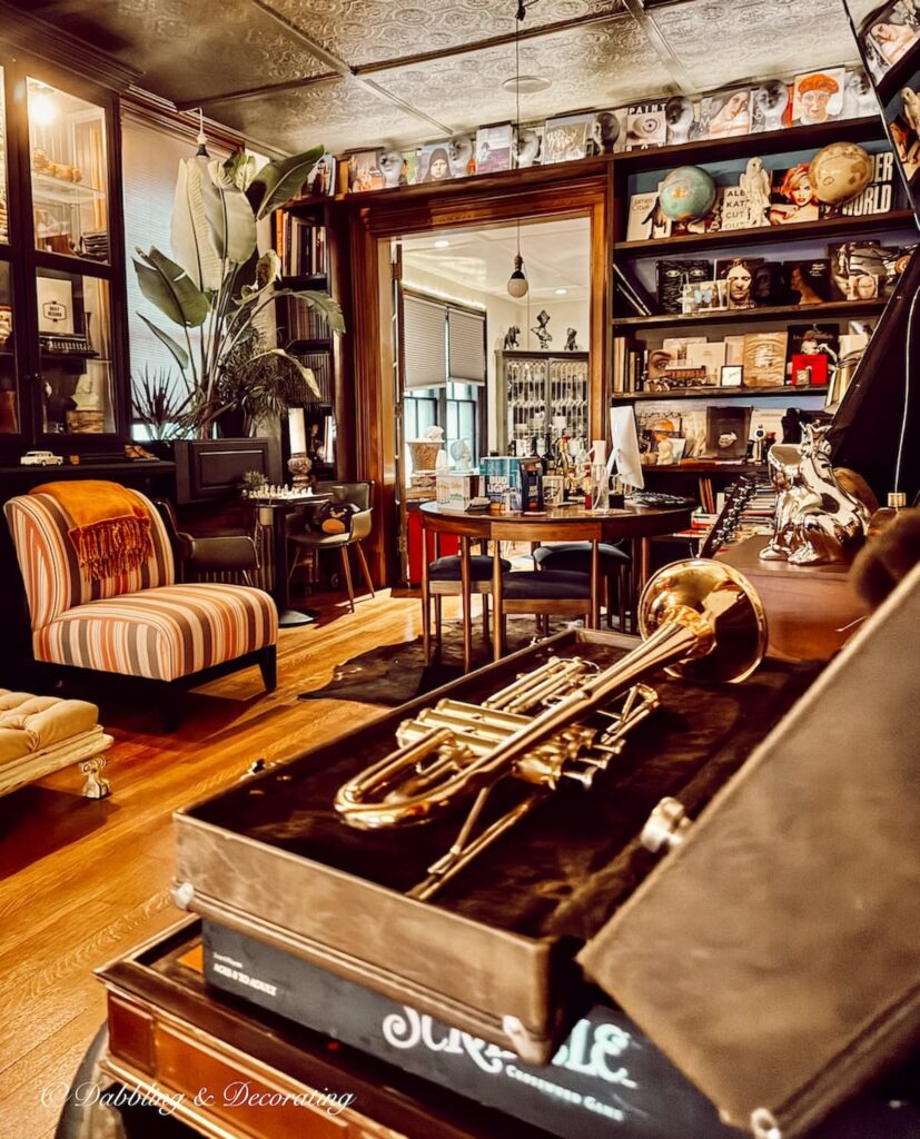 Inside Made INN Vermont antiquing in Burlington, Vermont. Eclectic living room.
