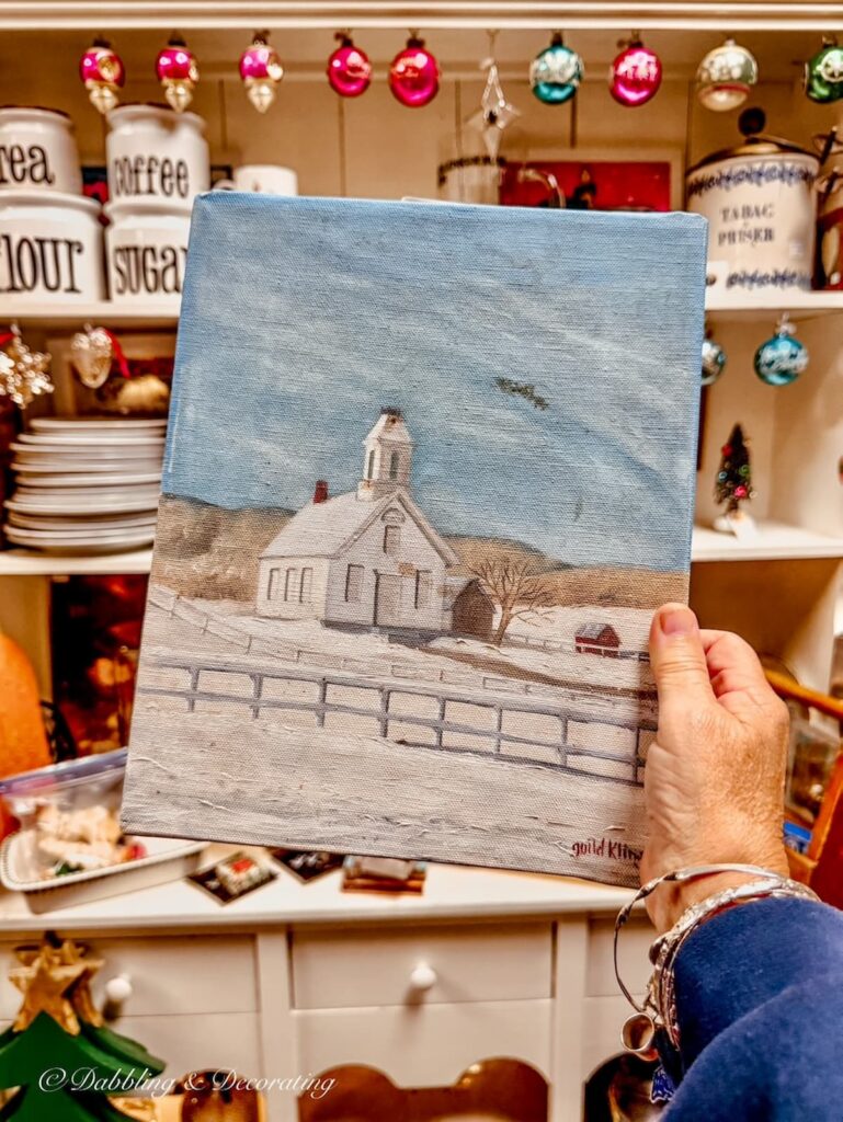 Blue Vermont painting of an old school building in the snow and blue skies The Vintage Inspired Market antiquing in Burlington, Vermont.