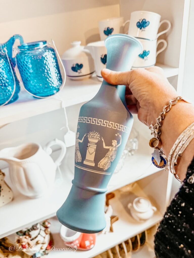 WedgeWood vase in hand at Nifty Thrifty shop in Brandon, Vermont.