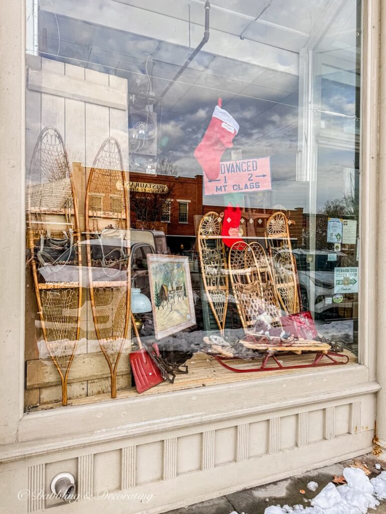 Across the street antique shop in Brandon, Vermont window shopping.