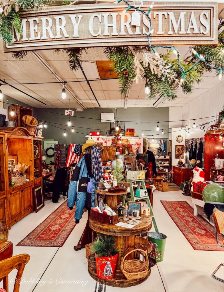 Back room at Across the Street antique shops in Brandon, Vermont filled with Christmas, Ralph Lauren, and vintage vibes.