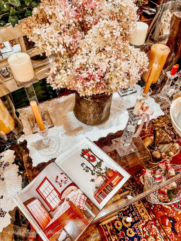 Antique styled vignette with Country Living Magazine in antique shops in Brandon, Vermont.
