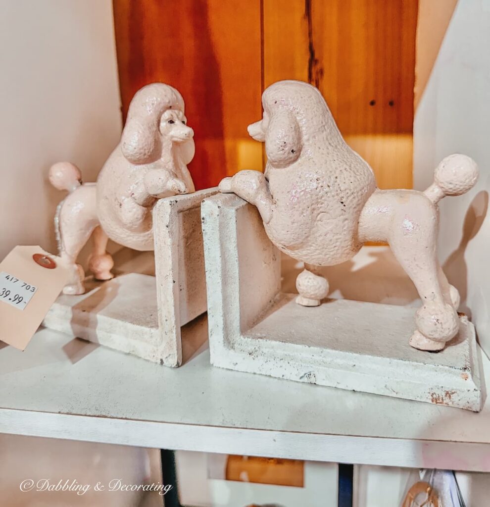 A pair of wrought iron bookends with pink poodles at The Willows, Maine's largest indoor flea market