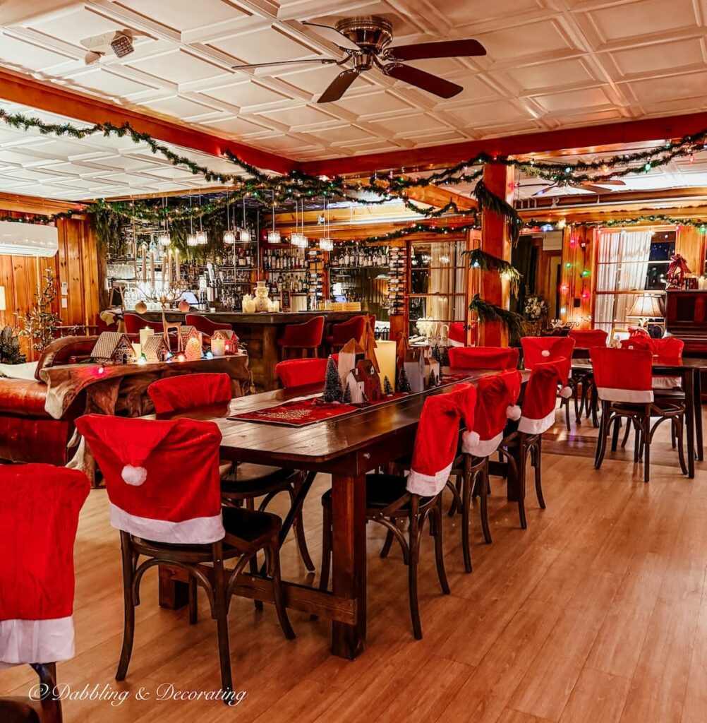 The Wolfe Cove Inn in Poland Maine's dining room decorated at Christmas time