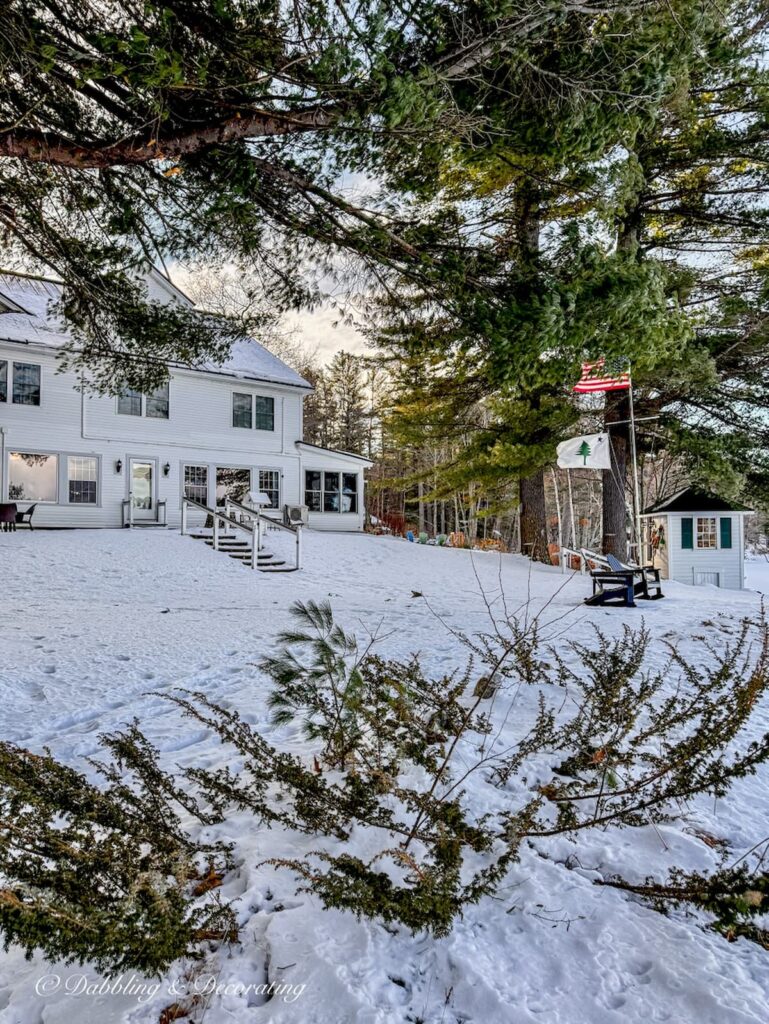 The Wolf Cove Inn in Poland, Maine on a very cold windy winter day in the snow from the Lake's view.