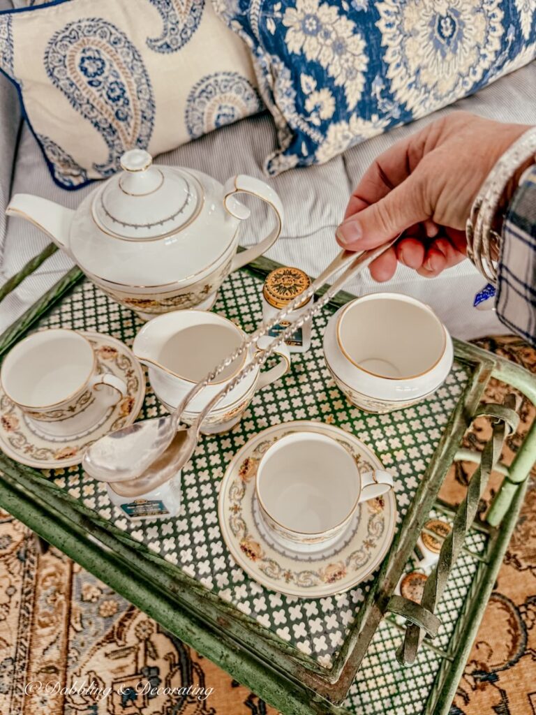Tea cart styling ideas with the Aynsley Banquet tea set, antique bar cart and vintage silver spoons.
