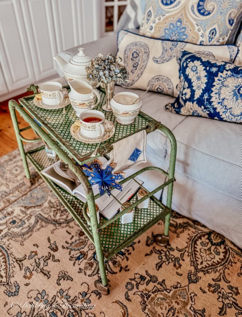Tea cart styling ideas with antique beverage cart and Ansley's Banquet Tea set in cozy living room.