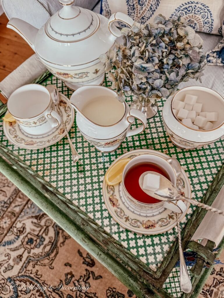 Tea cart styling ideas with Aynsley Banquet tea set on antique beverage cart.