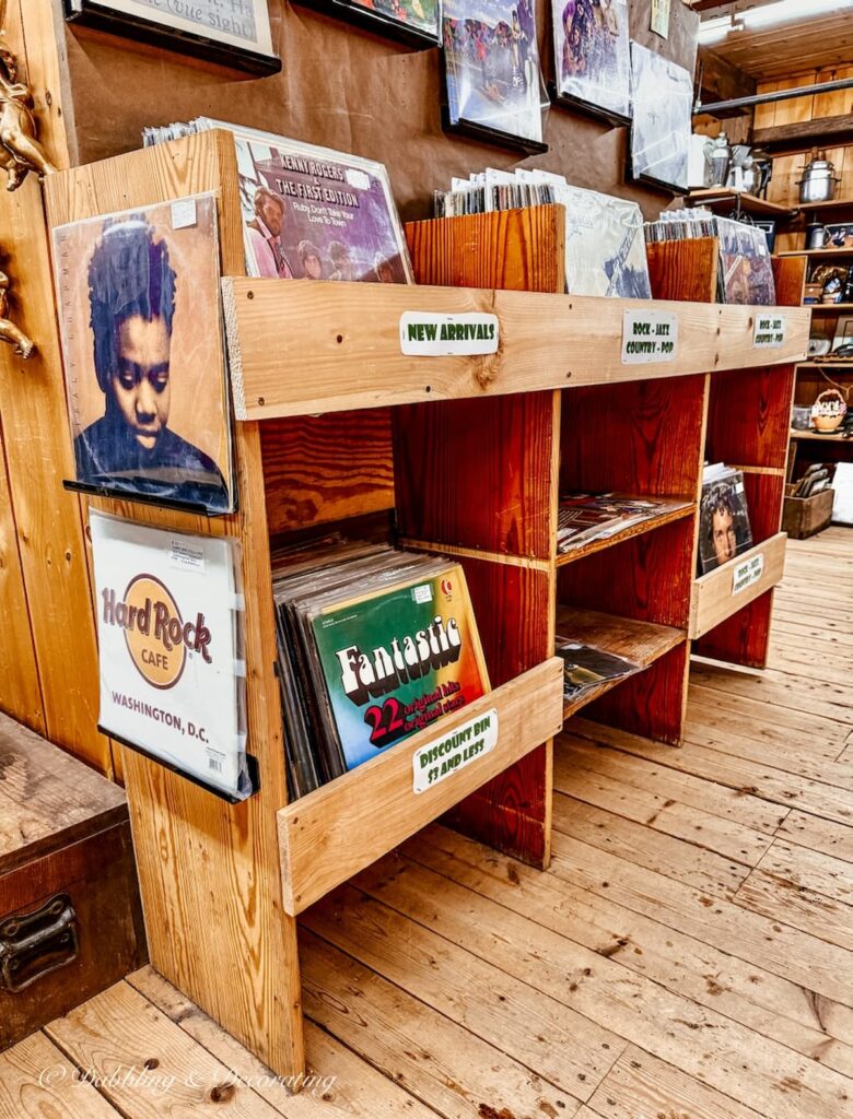 Wooden shelves with vintage vinyl at The Vermont Antique Mall.