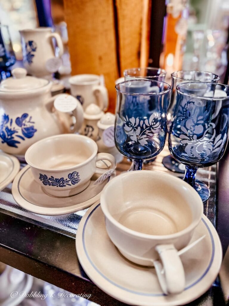 Vintage Phaltzgraff with matching blue glassware at Vermont Antique Mall in Woodstock, Vermont