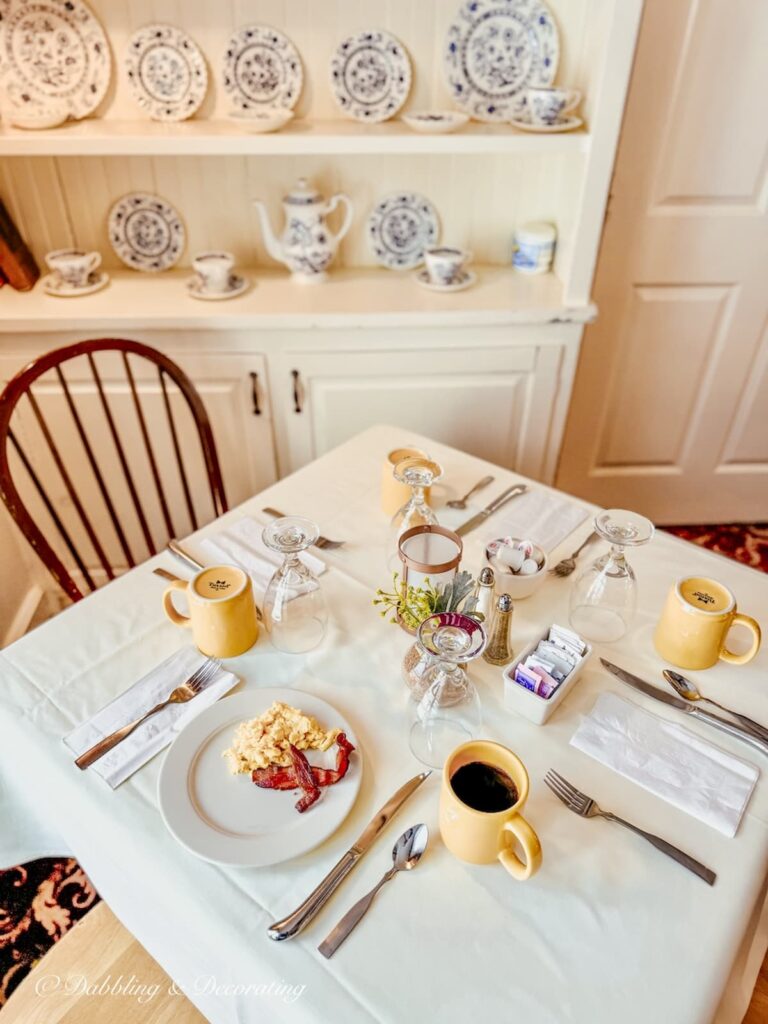 Sunny breakfast table in the dining room at The Quechee Inn at Marshland Farm in Vermont.