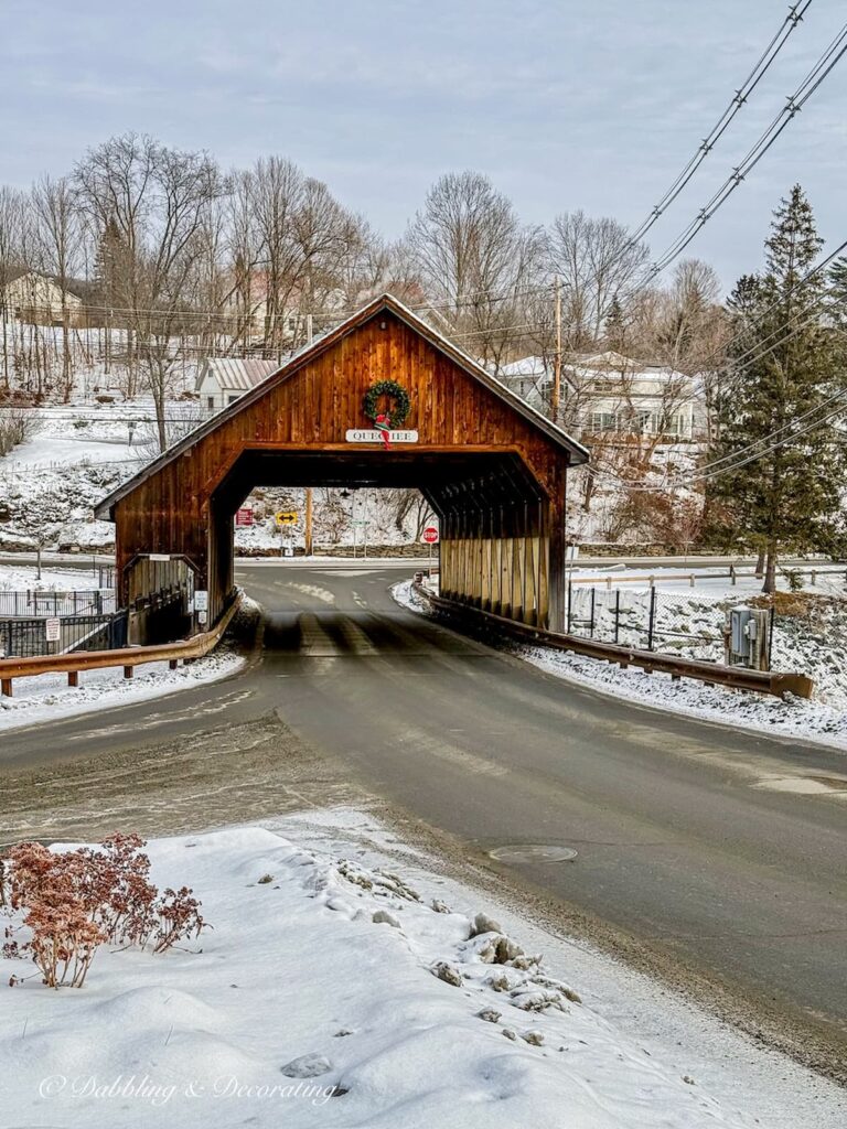 Quechee Vermont covered bridge in the snow next to Simon Pearce.