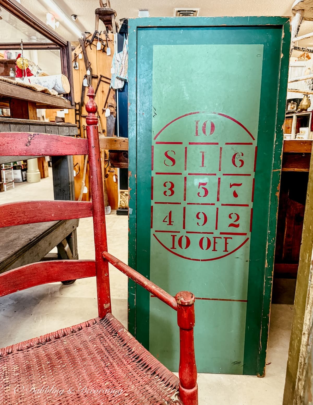 Antique large green board game in antique store for apres ski decor ideas.