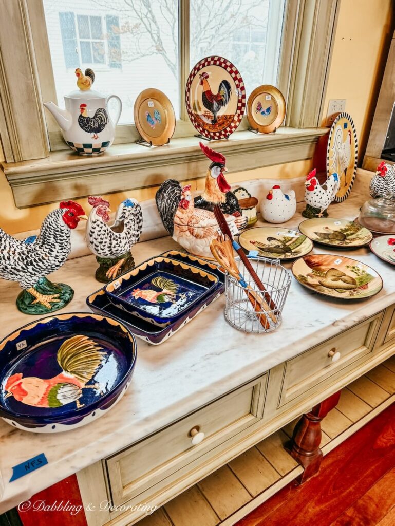 A collection of rooster kitchen decor items in how to shop estate sales in a luxury home.