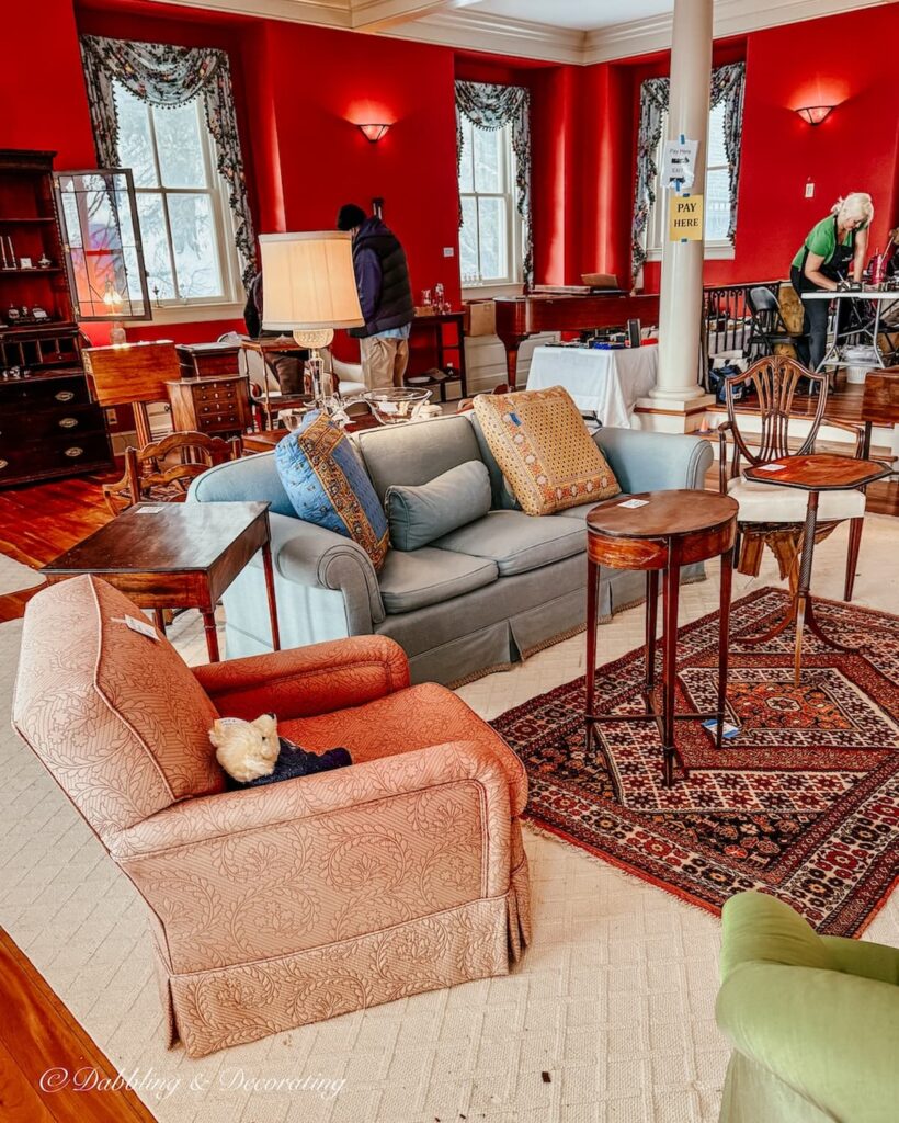 Inside luxury Vermont home living room filled with antiques in how to shop estate sales.