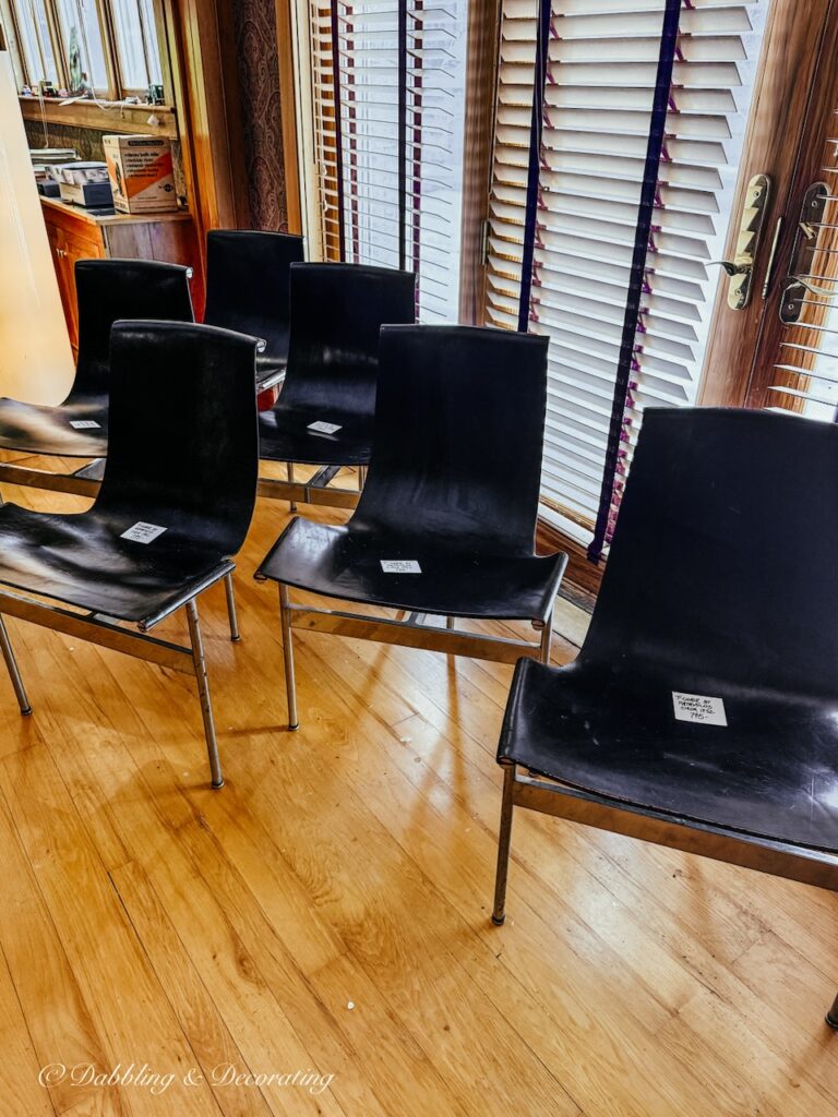 6 leather and metal chairs priced at $795 each at a luxury estate sale in Vermont, how to shop estate sales on a budget.