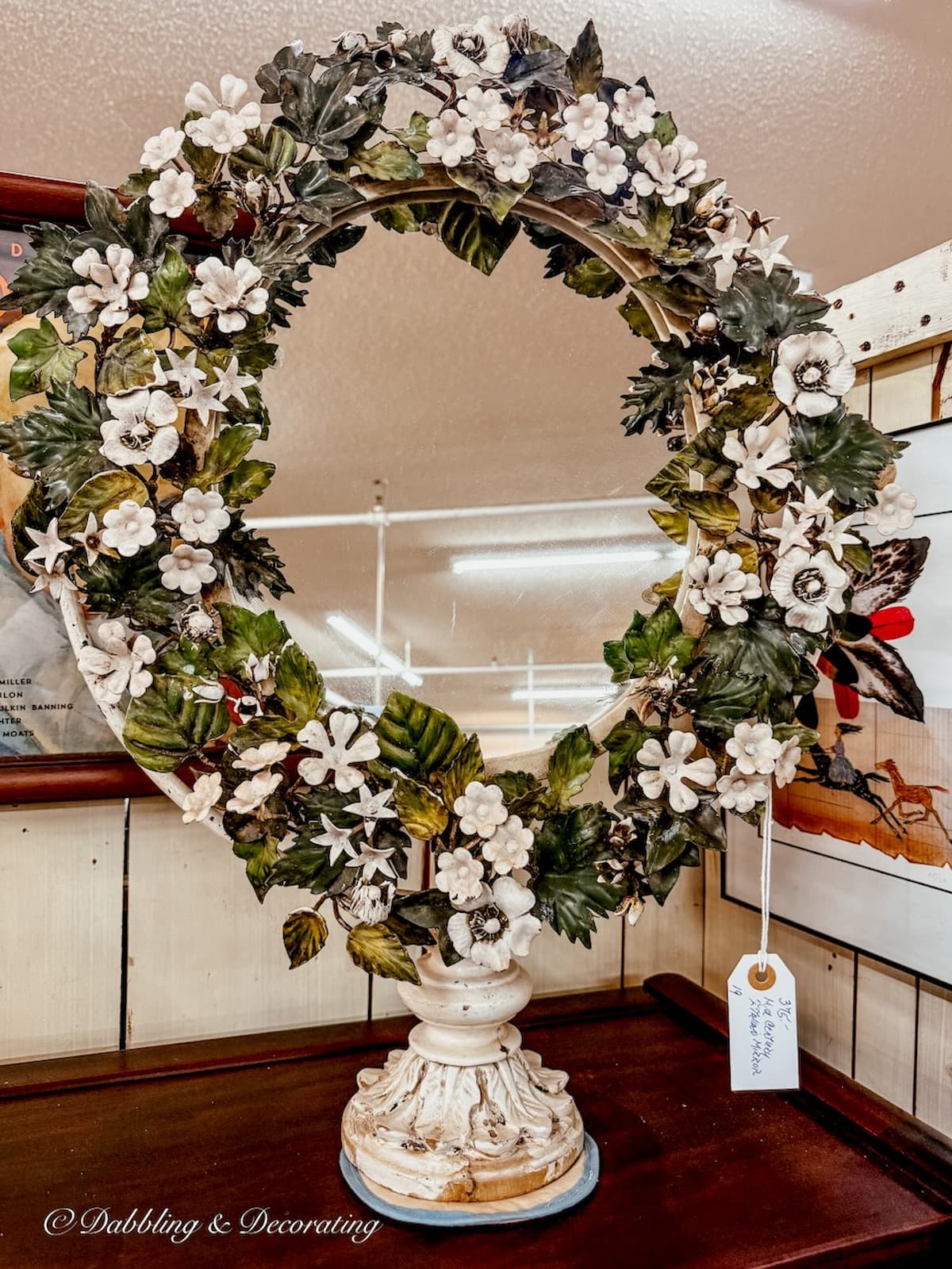 Antique green and white floral mirror in antique store, beautiful vintage St. Patrick's Day decor ideas.