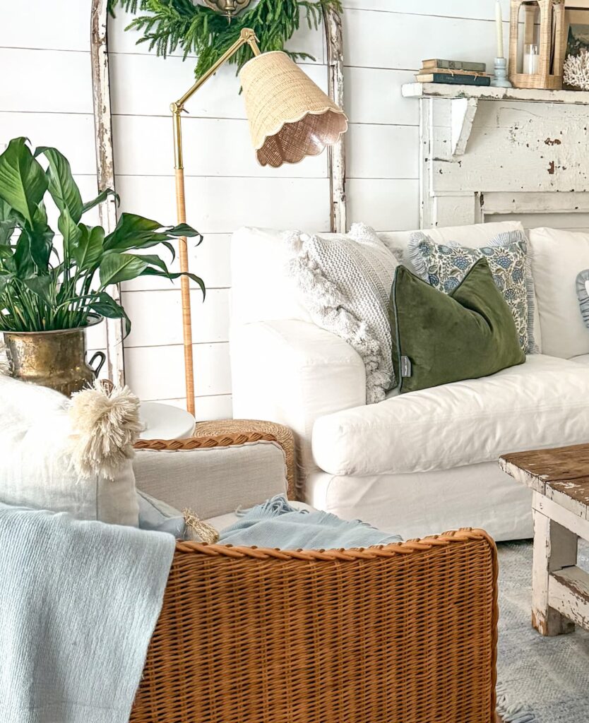 White farmhouse decor styled for winter with touches of green.
