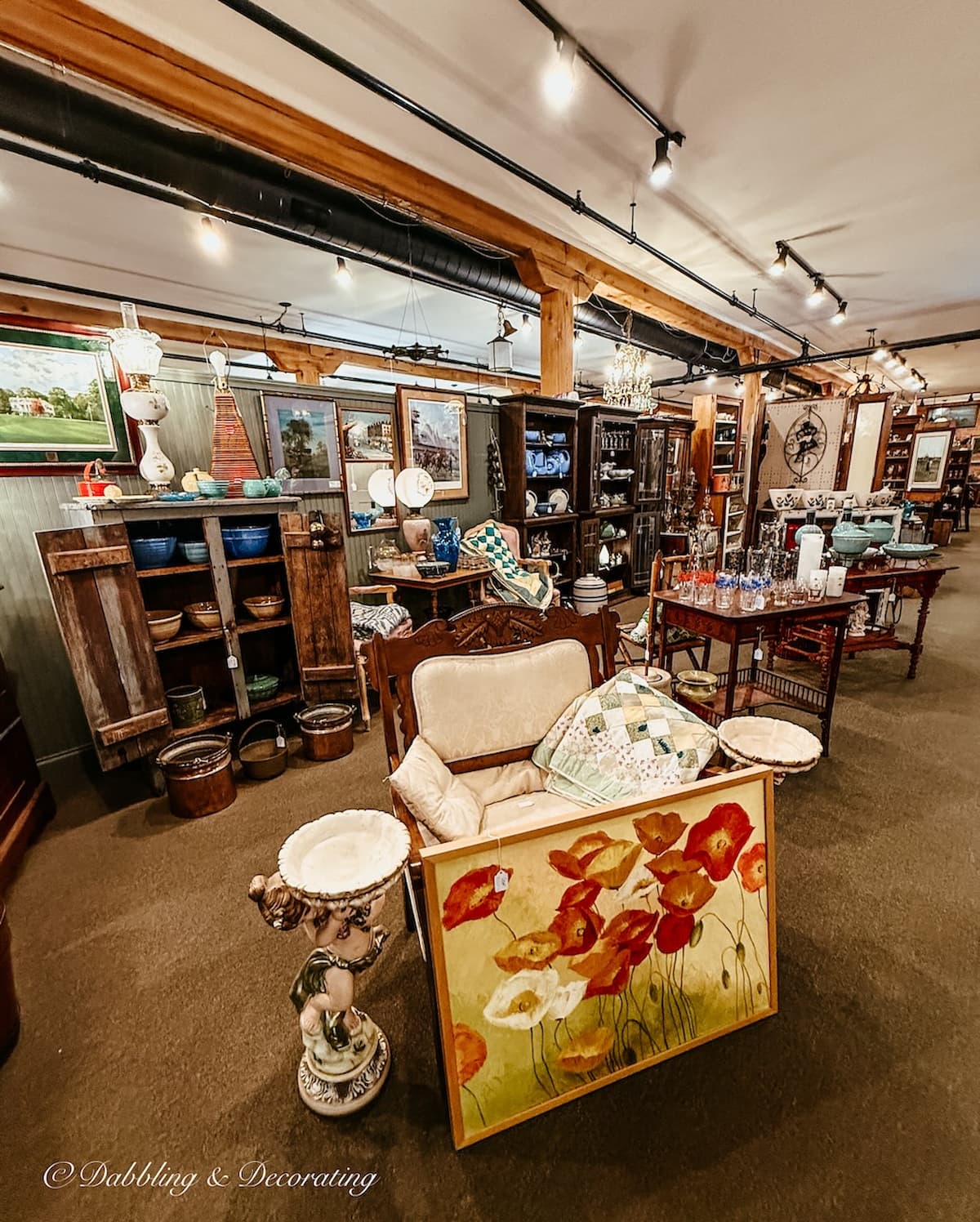 Beautifully curated and styled antique booth at Waverly Square Antiques in Saratoga Springs, NY.