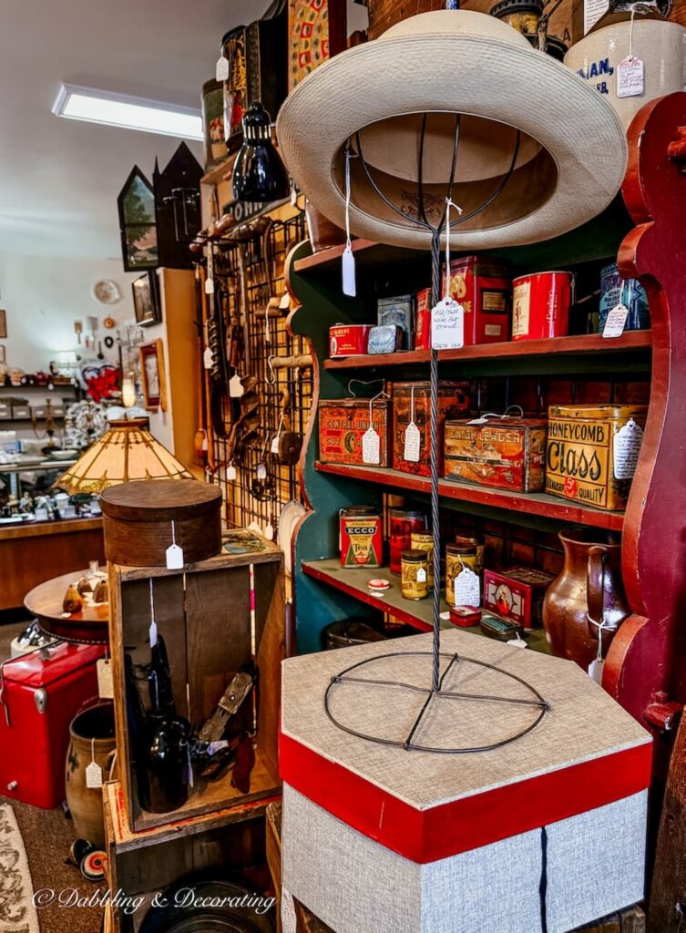 Vintage hat on hat stand antiquing in Saratoga Springs, NY at Stone Soup Antiques.